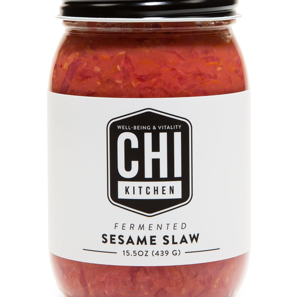 Jar of fermented sesame slaw from CHI Kitchen on a white background