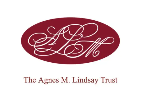 Logo of The Agnes M. Lindsay Trust with a red oval and white text on a white background