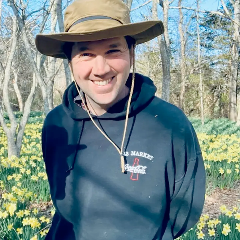 Andrew Hamilton, Operations Coordinator at Coastal Foodshed, pictured outside