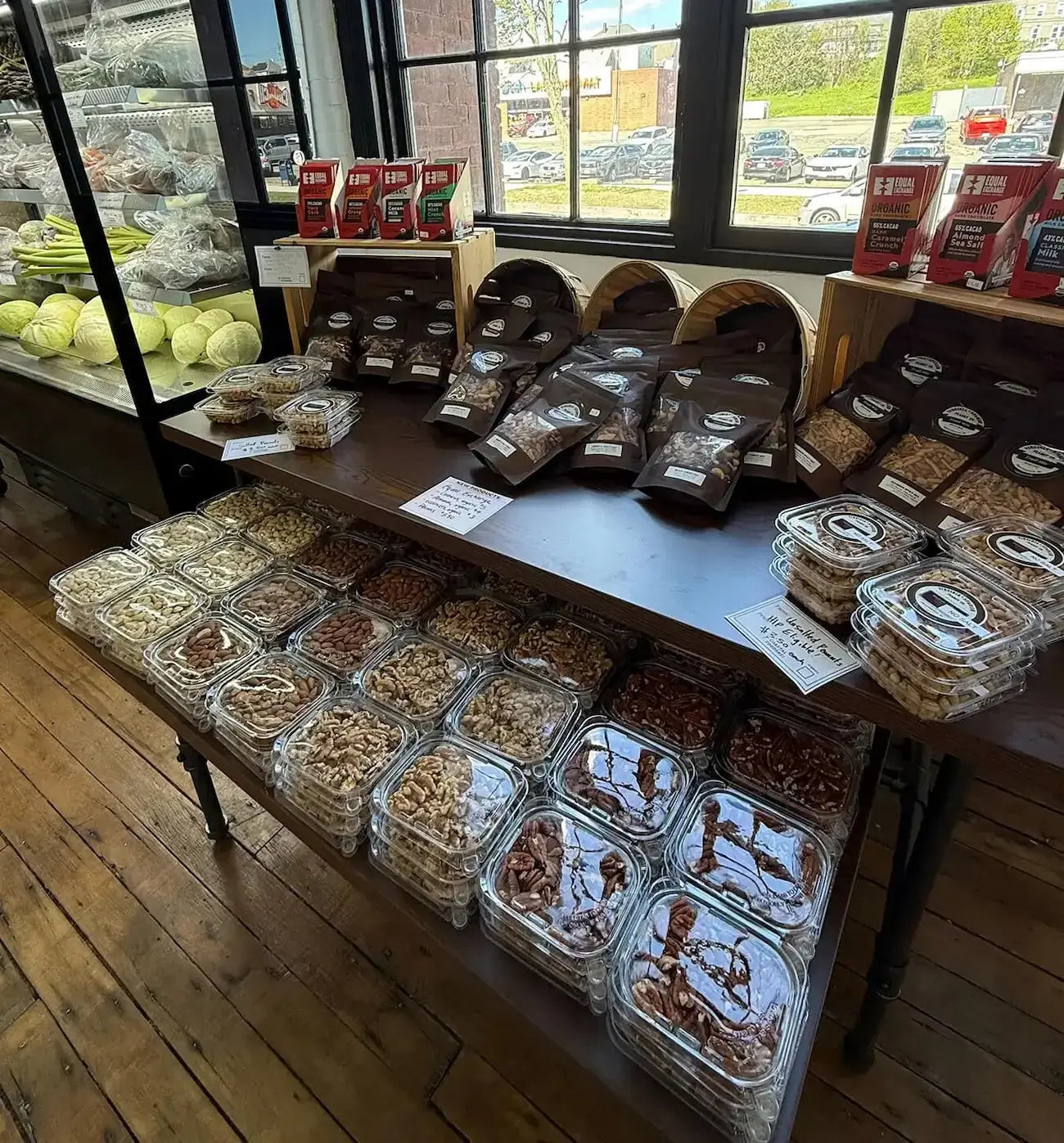 various packaged food items on display table inside store
